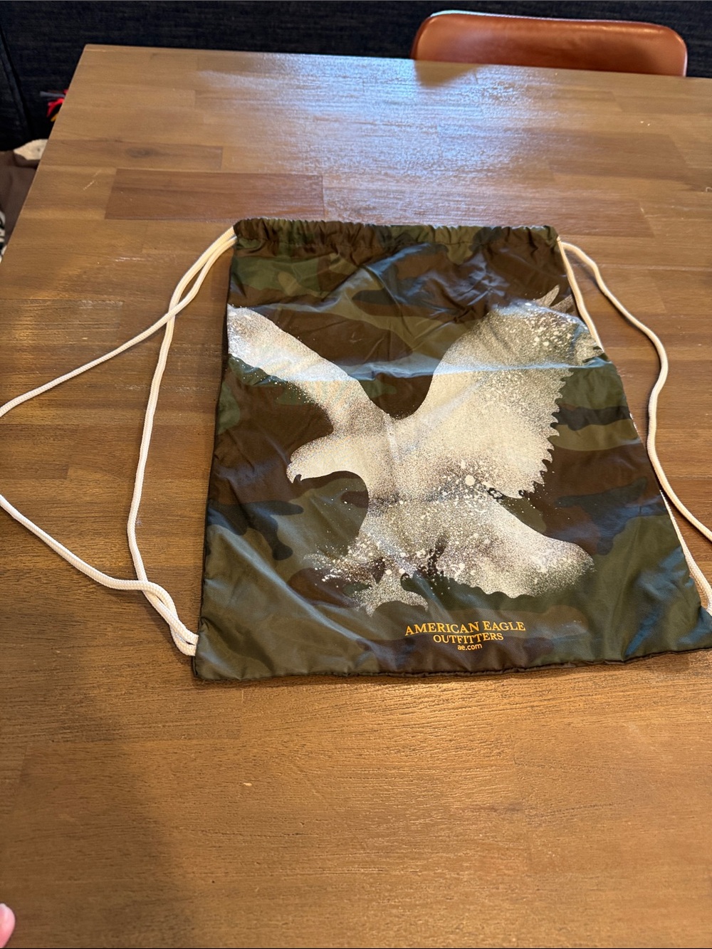 American Eagle Outfitters Camo Drawstring Backpack with White Eagle Graphic